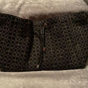 Kate Spade Purse. Black design with light gold stitching. Very good condition.